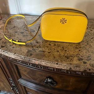 Tory Burch leather yellow crossbody bag.